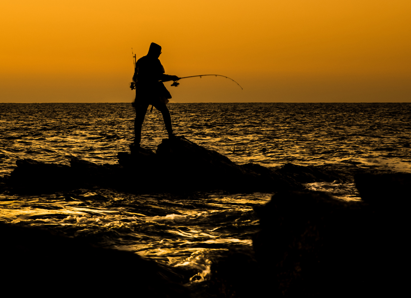 Rock Fishing by Julie Deer
