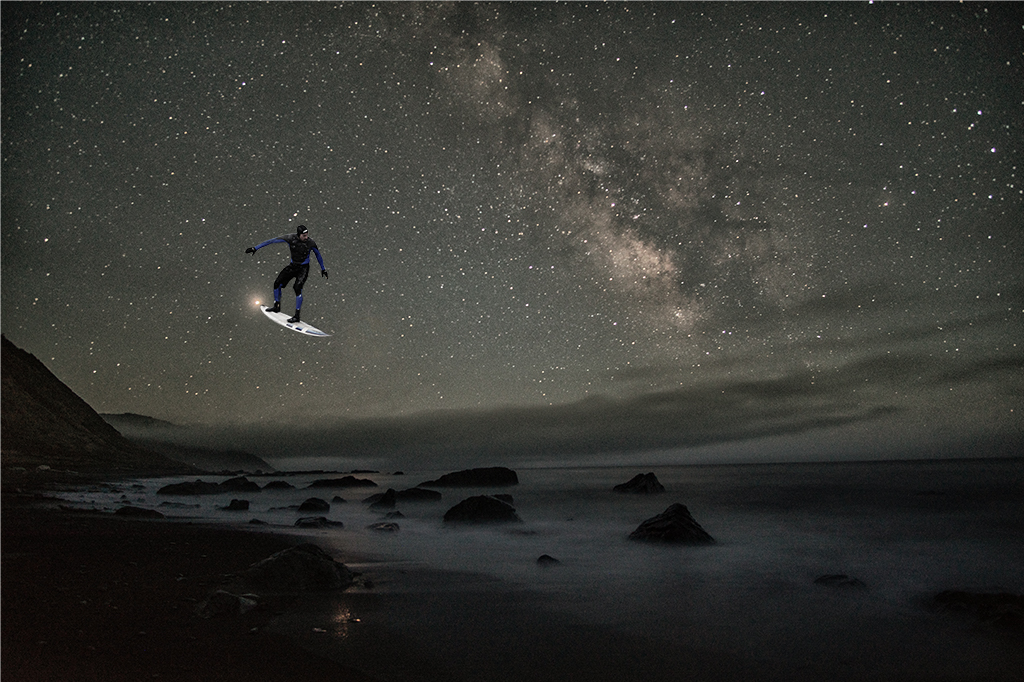 Night surfing by Brad Becker