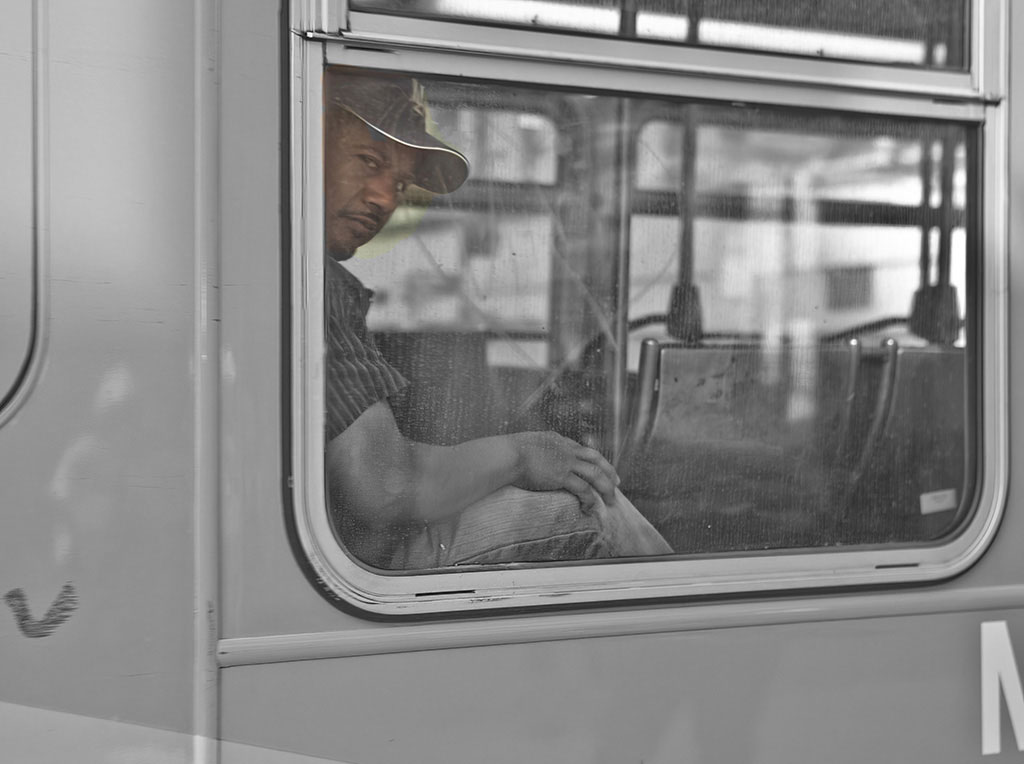 Man-On-Bus by Jeff Bock