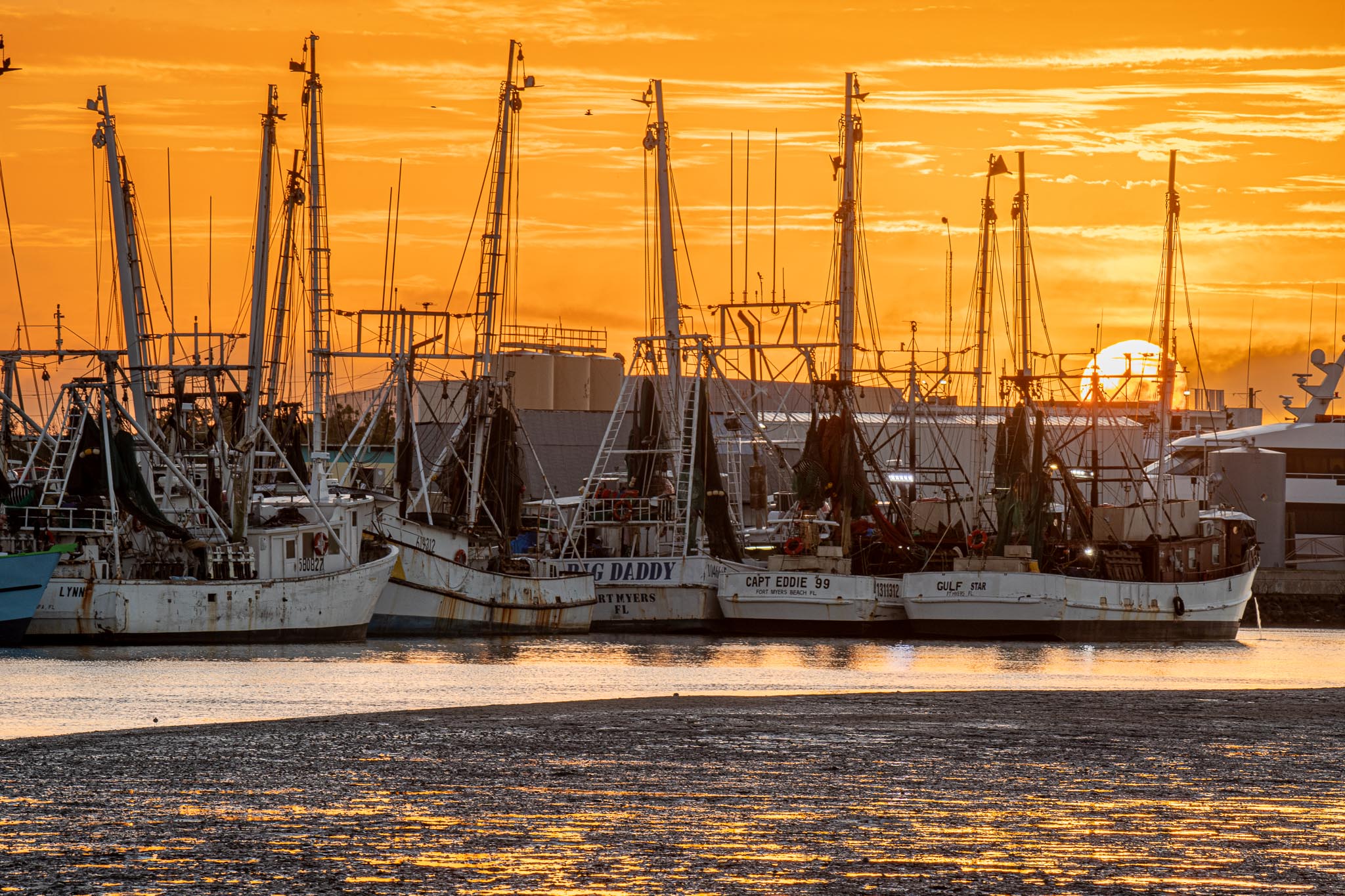 Sunrise over Shrimping fleet by Jim Wulpi