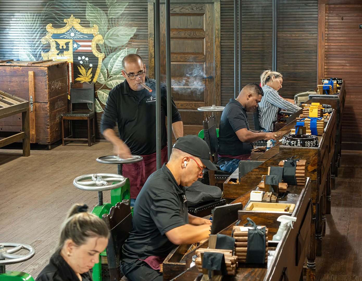 Eyeing his charges-Newman Cigar Co by Erik Rosengren