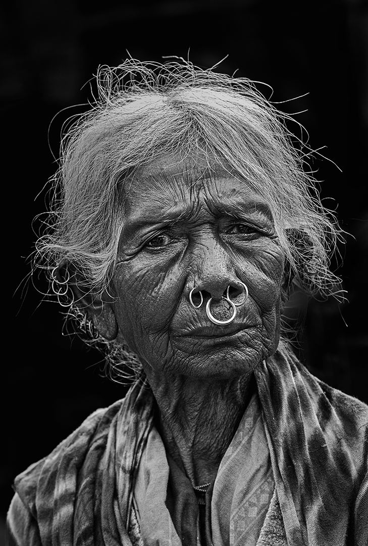 The old tribal lady by Dr Aishwarya Mukherjee