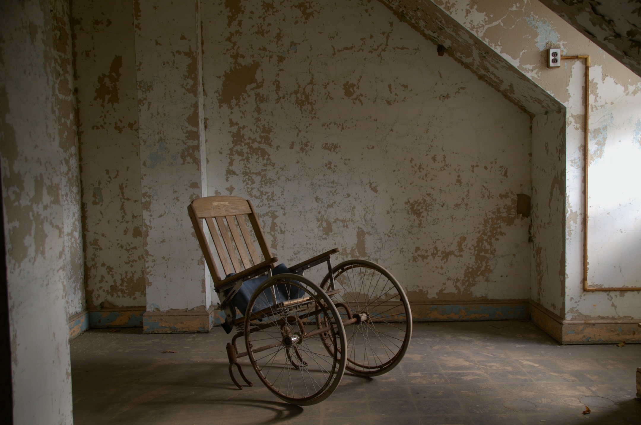 an OLD WHEELCHAIR by Russell Hunt