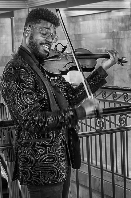 Violinist in Grand Central Terminal by Norm Solomon