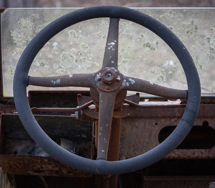 Old Steering Wheel by Mike Patterson