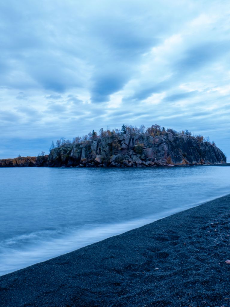 Sunrise at Black Beach by Kathy Brand