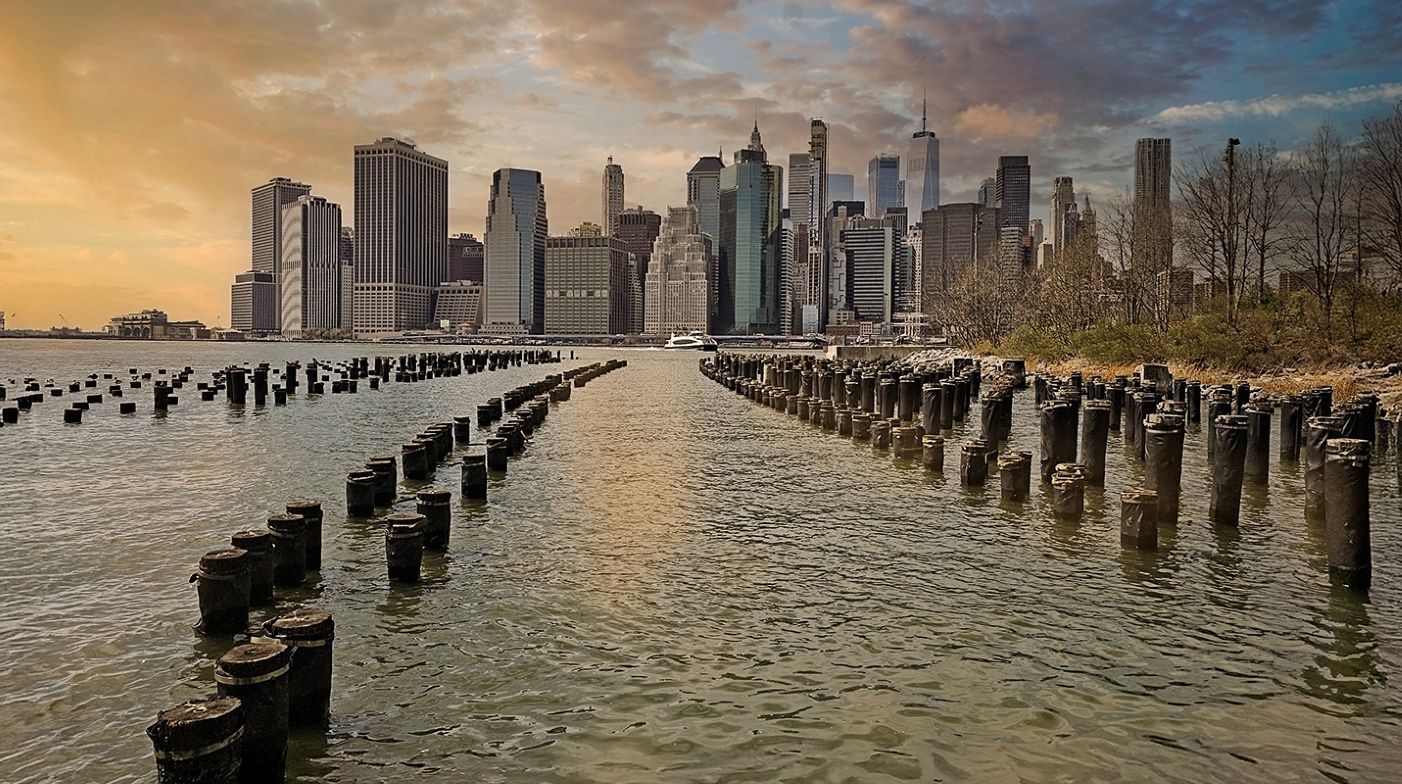 Manhattan in Sunset by Leonid Shectman