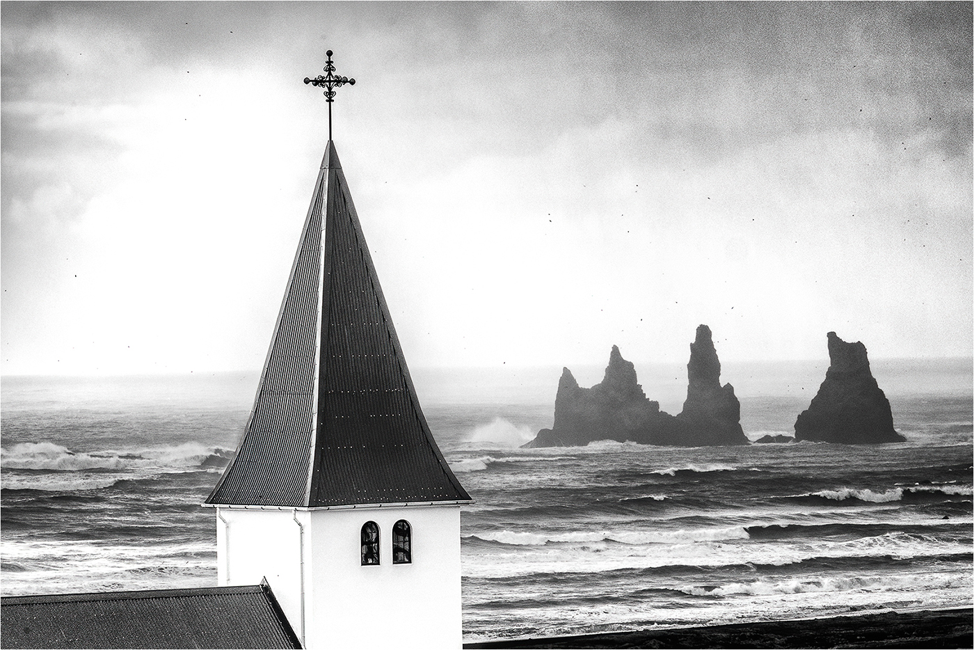 Vik Church and Sea Stacks by Peter Clark