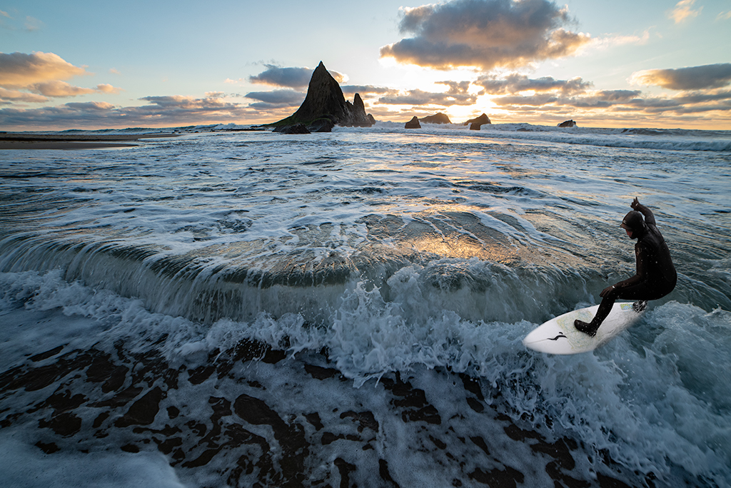 Night surfing by Brad Becker