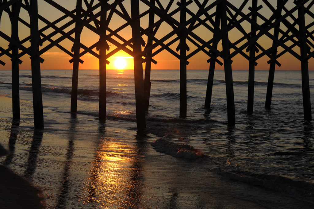Sunrise at Folly Beach by Phyllis Peterson