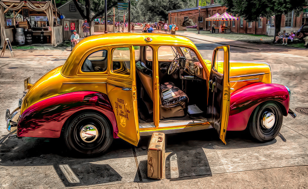Village Taxi by Ron Clegg