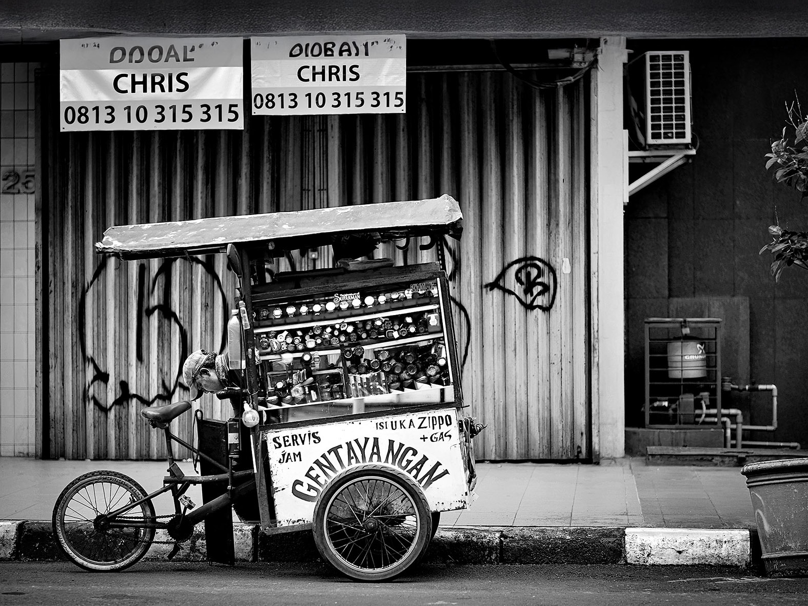 Watch Repair Man by Cisco Goncalves