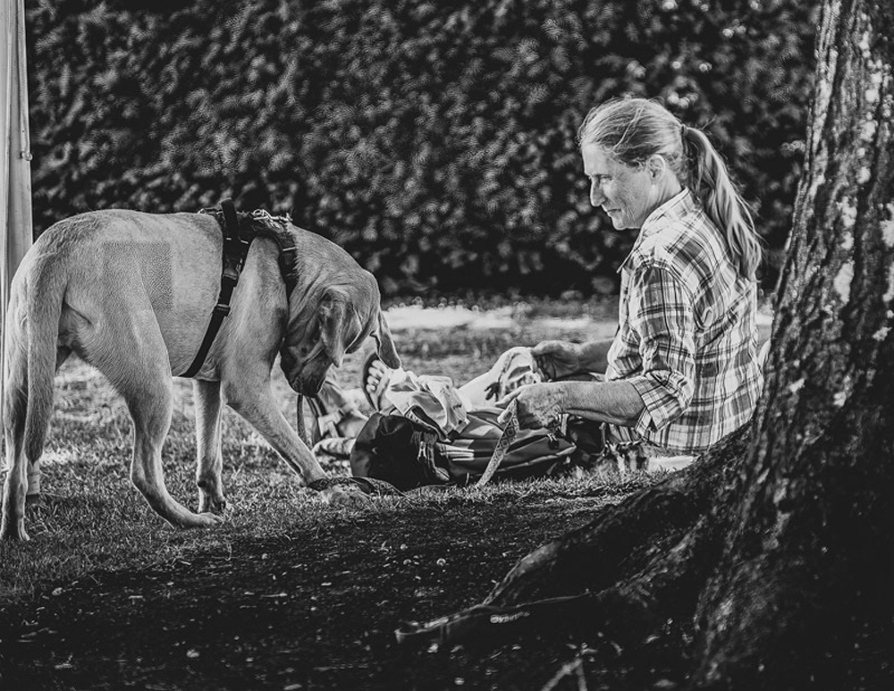 A Girl and Her Dog by Ed Taje