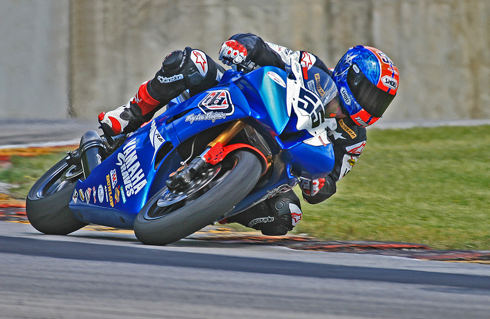 Blue Bike in Turn 6 by Gerald Emmerich Jr