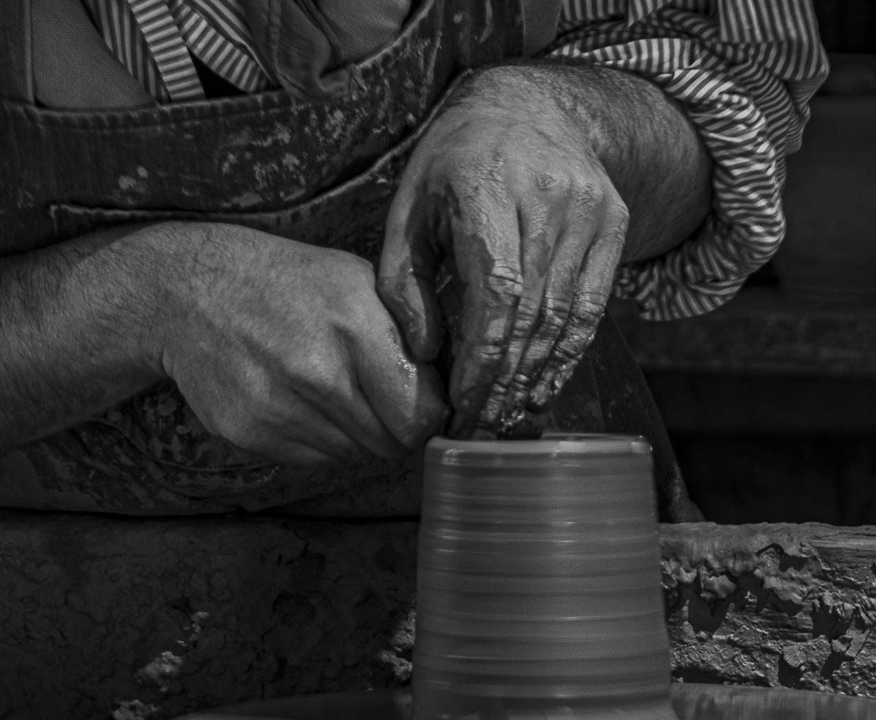 Potter's Hands at Work by Erin Lamb