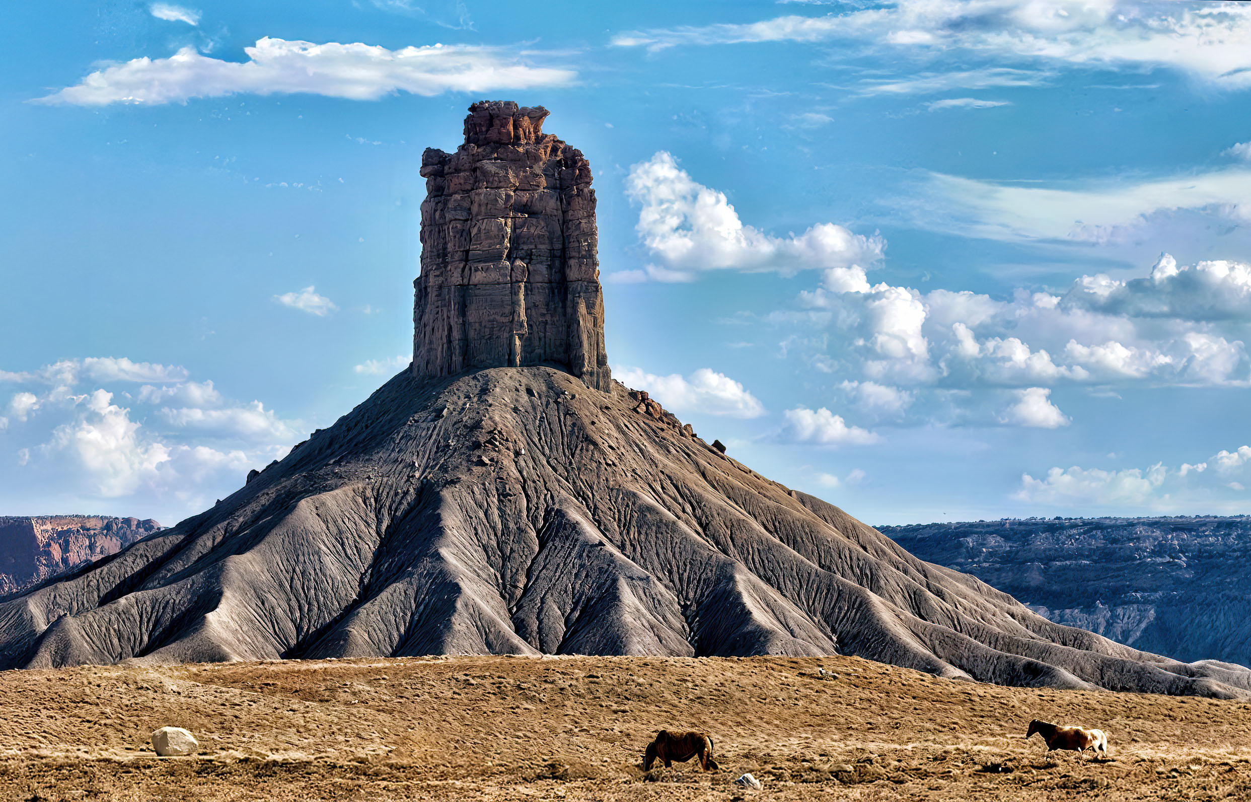 Horses in front of Factory Butte by Kirk Gulledge