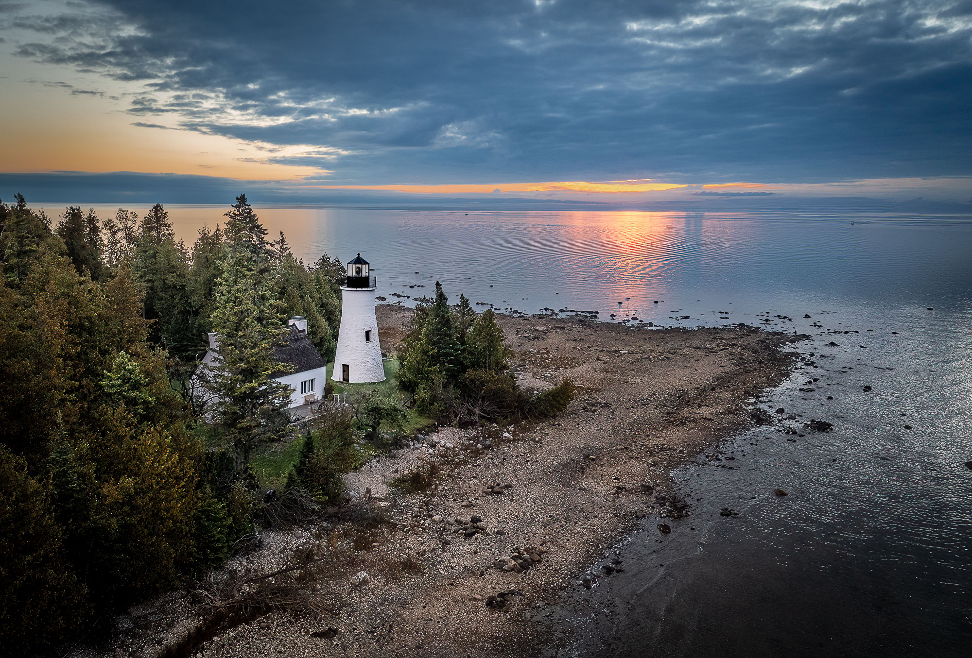 Sunrise at Old Presque Isle Lighthouse by Lou McLove