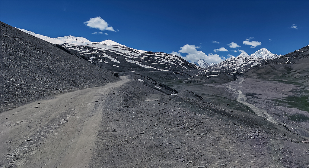 ROAD LEADS TO KUNZUM PASS by Sanat Kumar Karmakar